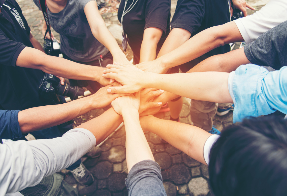 Volunteer Leader effective is key to success. Team Charity group of people giving thump up hands together. Volunteer Spirit Team Members. Volunteer Leader Concept.